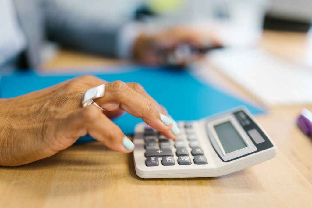 person with calculator